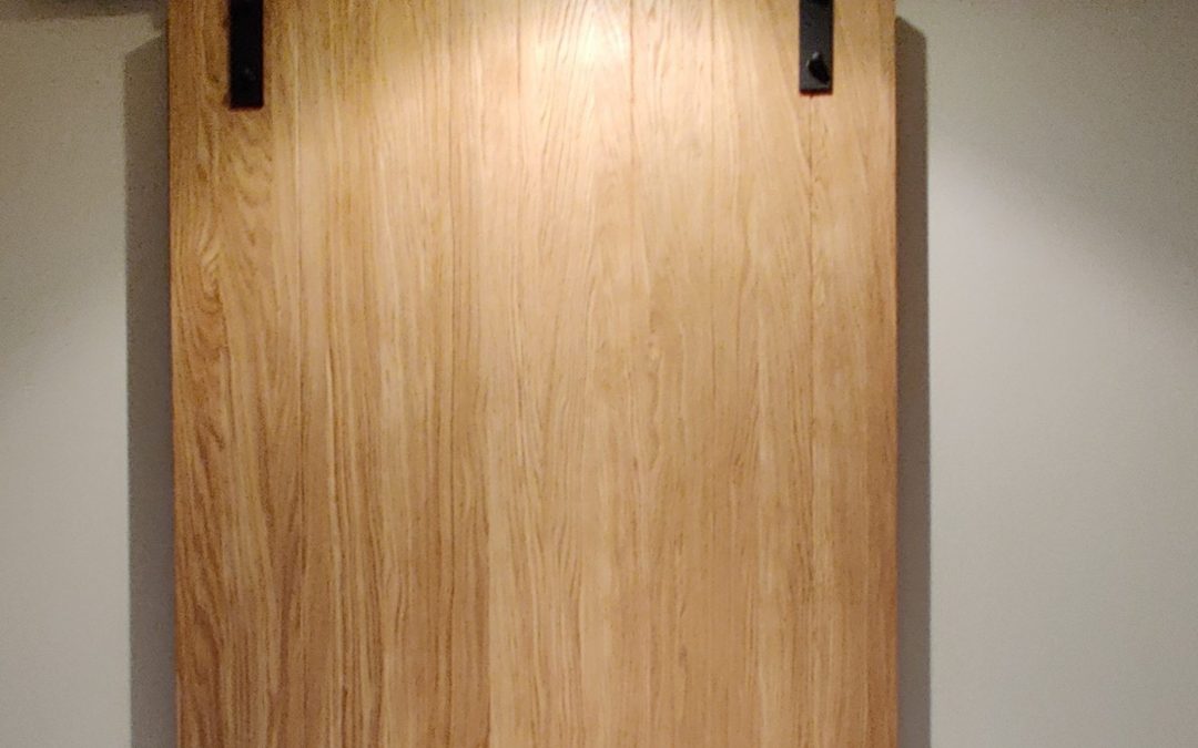 Porte coulissante en chêne à l’ancienne sur mesure